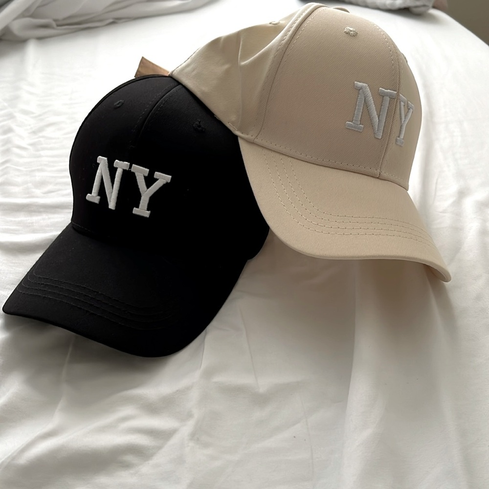 Baseball caps . Still new